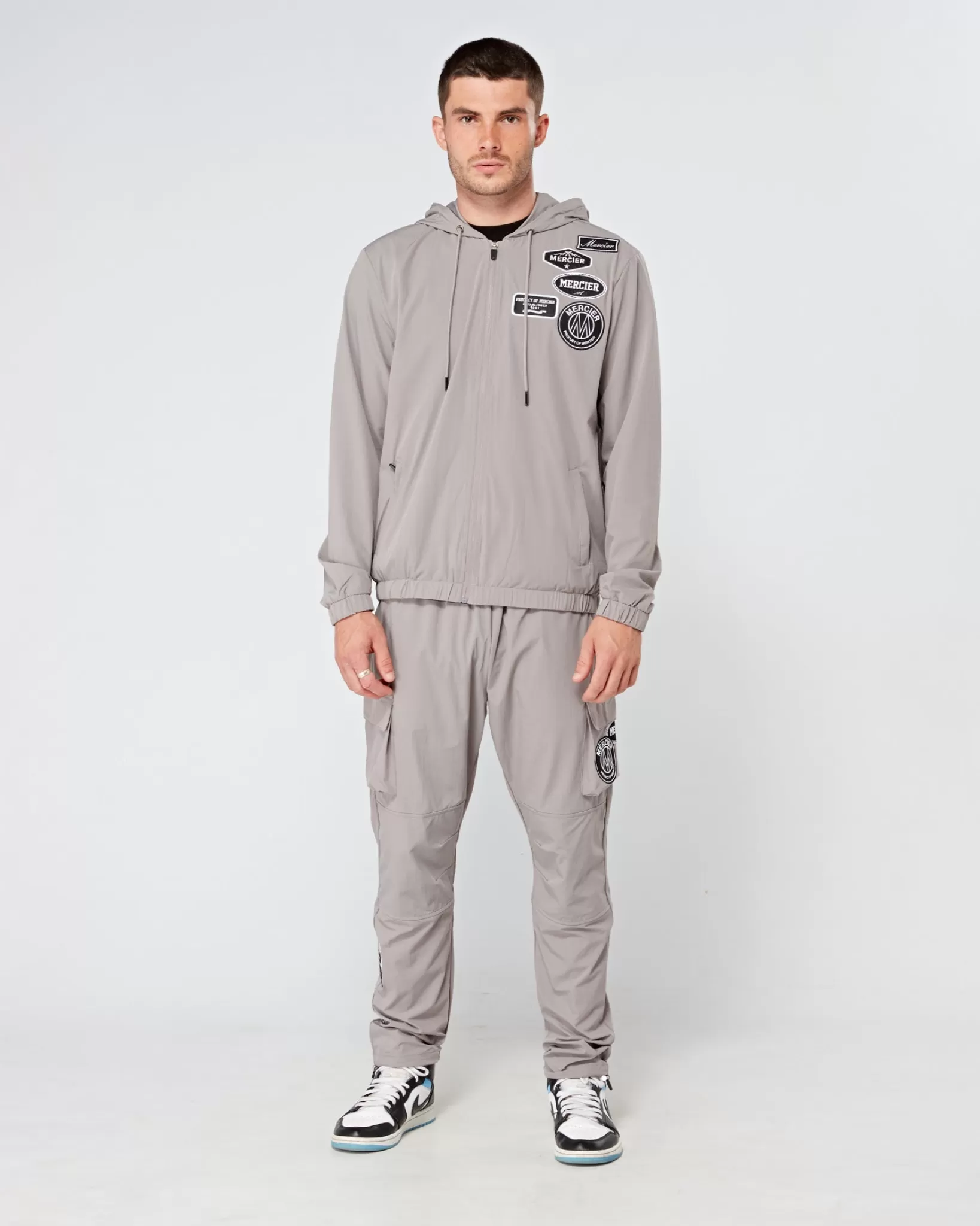 Sale Mercier Carichi di badge Mono in acciaio