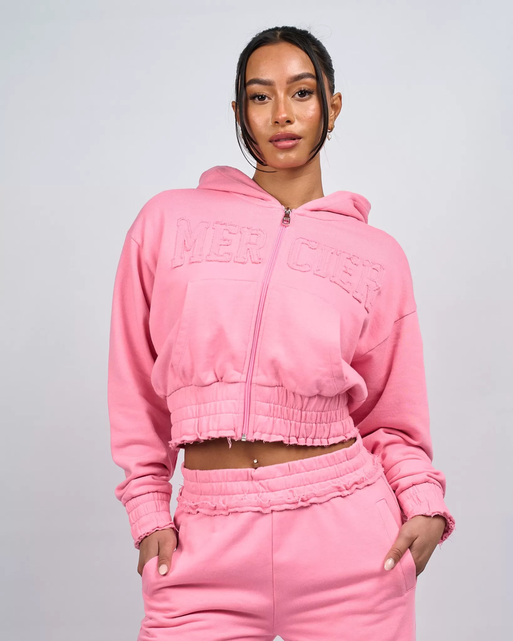 Store Mercier Felpa con cappuccio rosa con croppata in difficoltà da donna