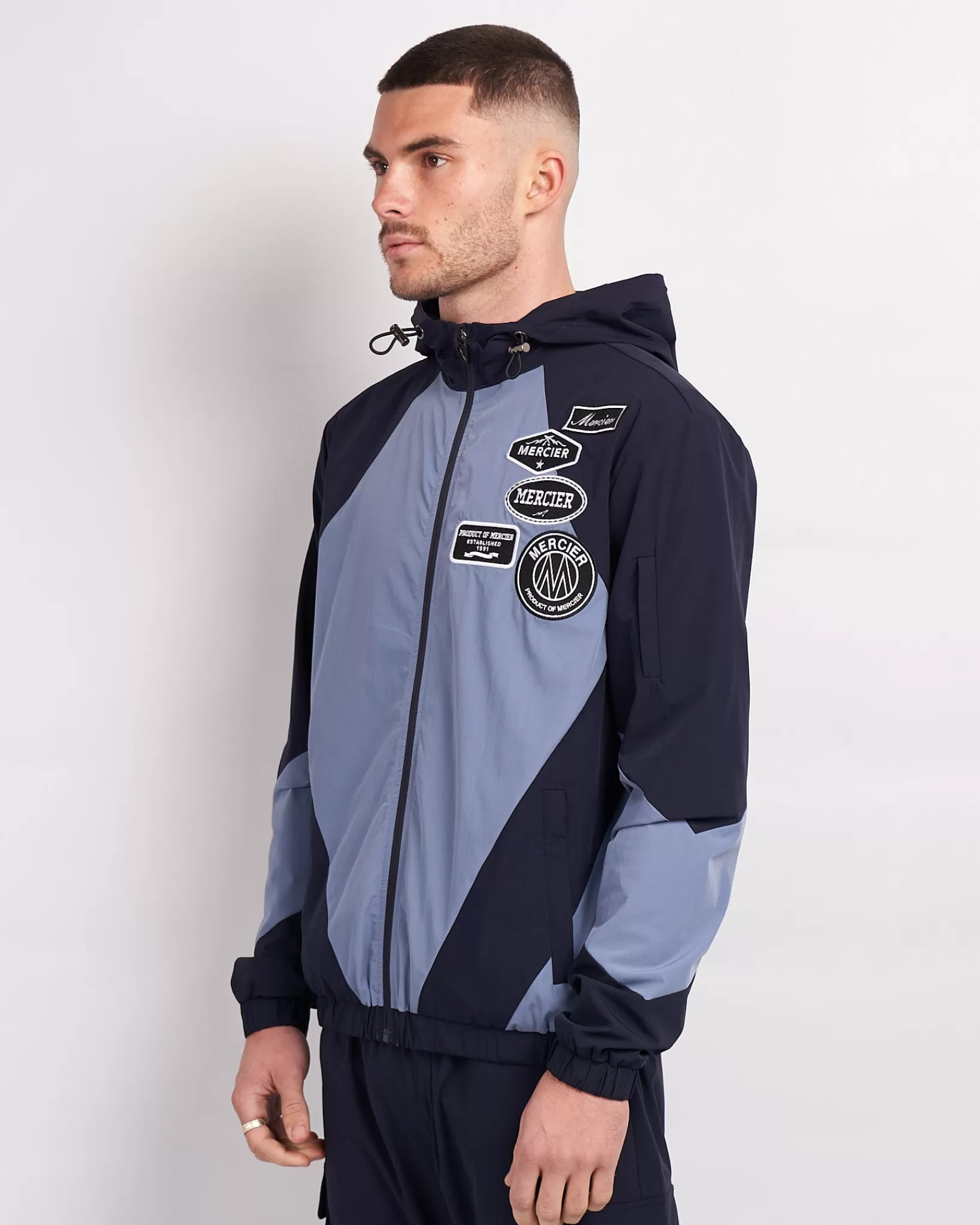 Store Mercier Giacca a vento con pannelli blu navy placid mono distintivo