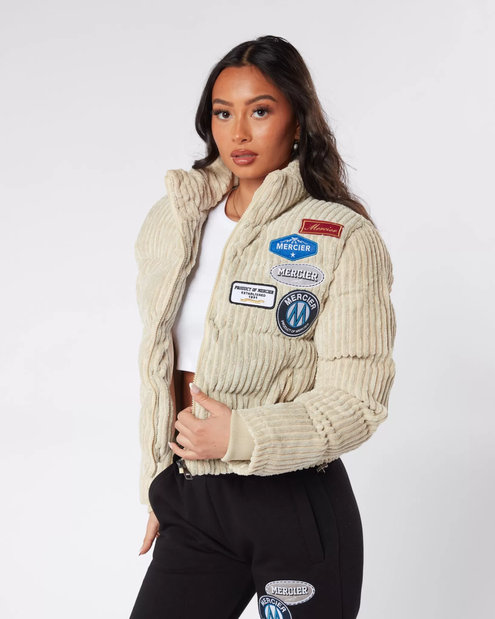 Best Mercier Giacca da donna con cordone beige e distintivo.